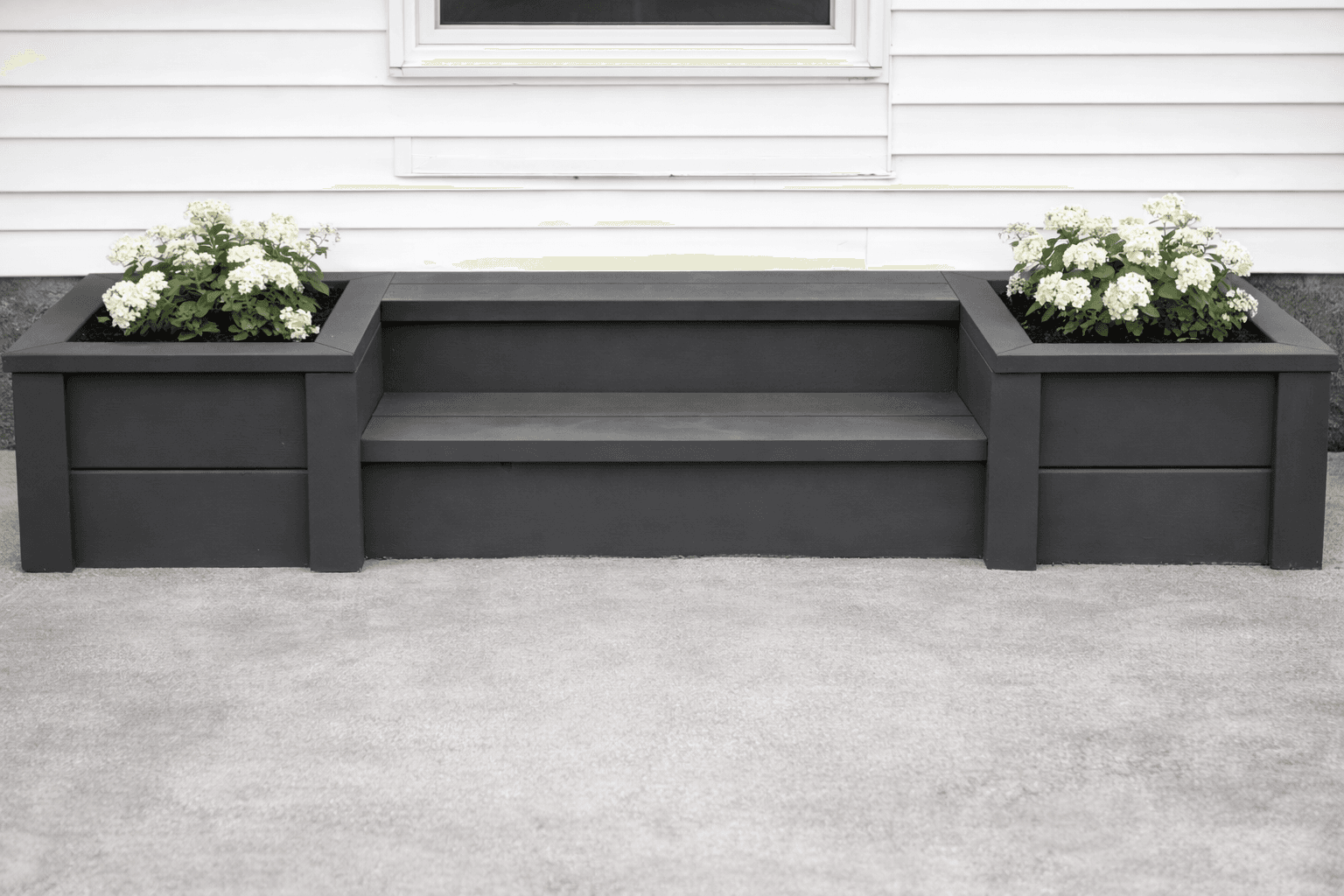Two-tier outdoor planter steps built from 2x8 lumber