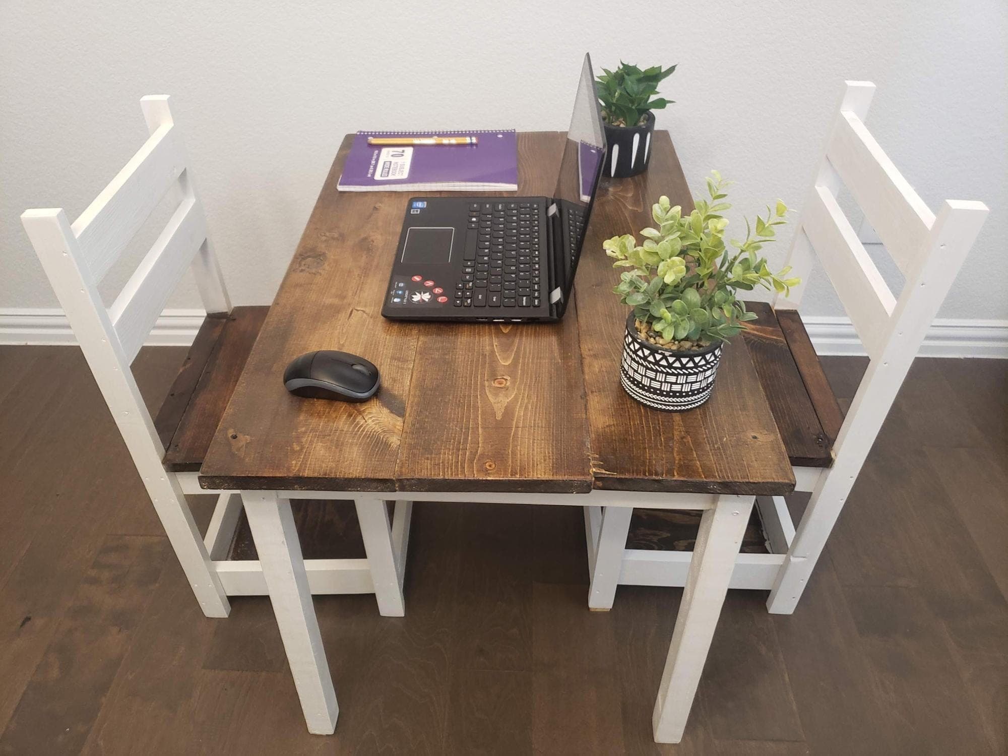 Simple small wooden kids play table with a three-board top