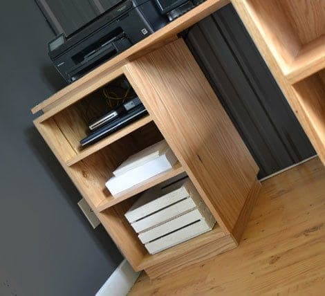 Frameless modern open-shelf base cabinet in edge-banded plywood