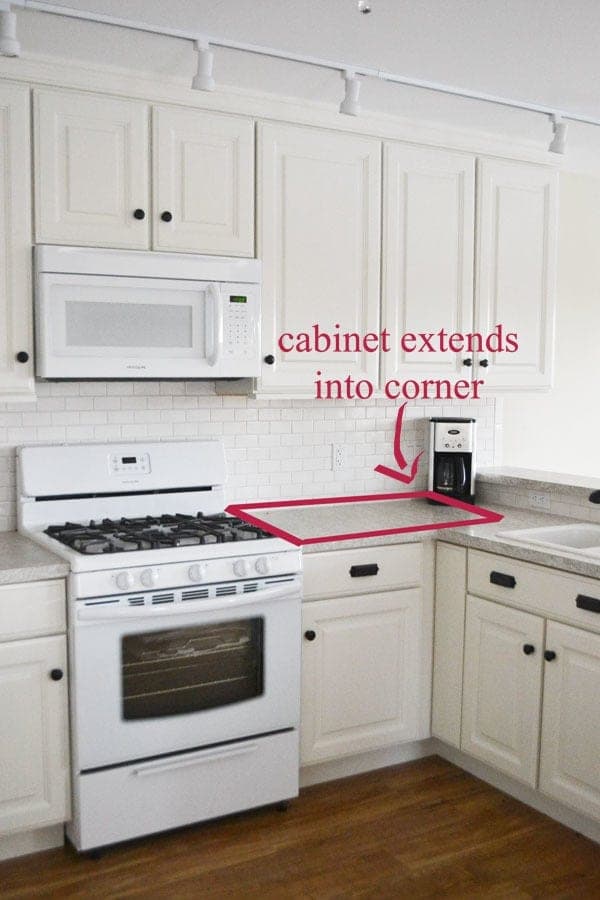 Fitted kitchen blind corner base cabinet with a face frame and overlay door