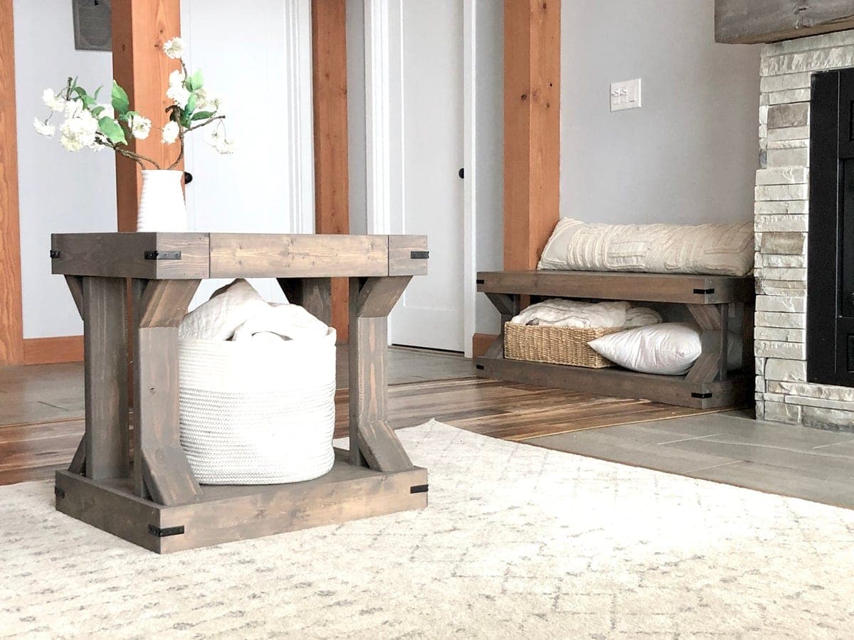 A modern farmhouse side table with two shelves and mitered X cross braces underneath
