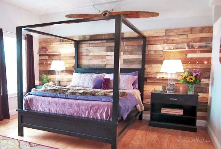 Farmhouse bed frame on tall corner posts sized for an added canopy