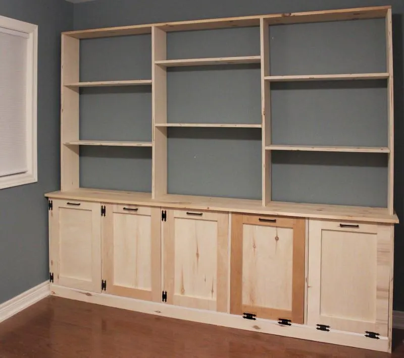 Shelving Unit with Storage and Tilt-Out Laundry