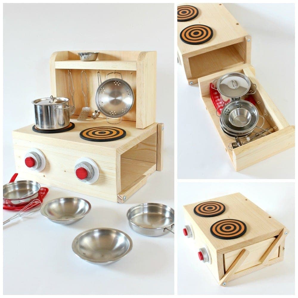 Small wooden tabletop toy kitchen with a lift-off hutch