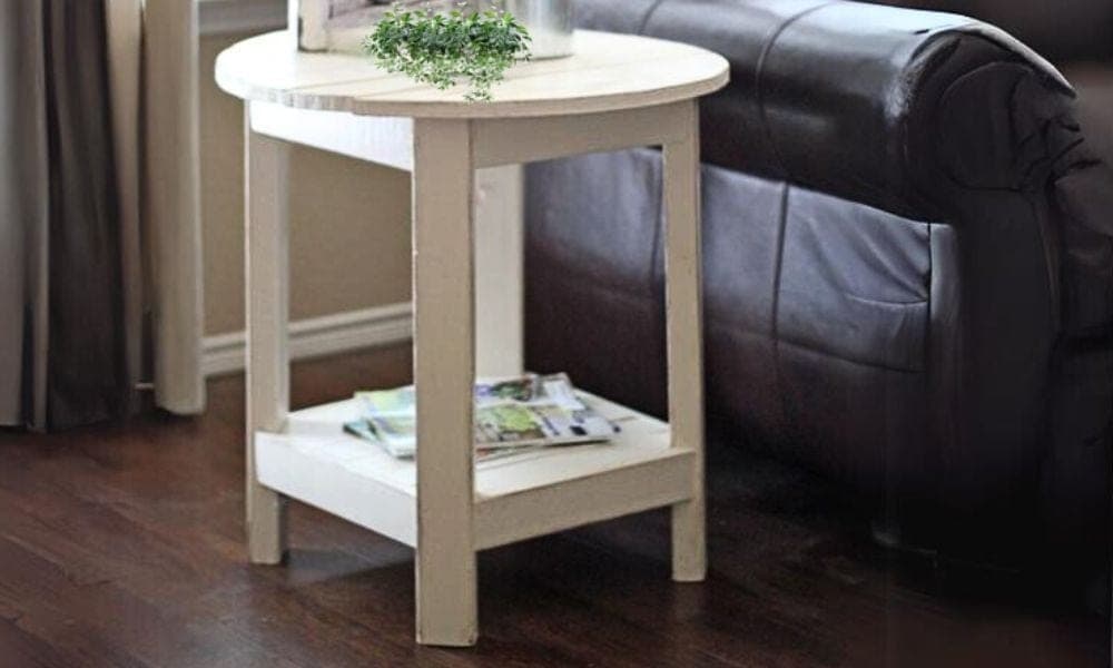 A round-topped end table with a mitered lower shelf skirt