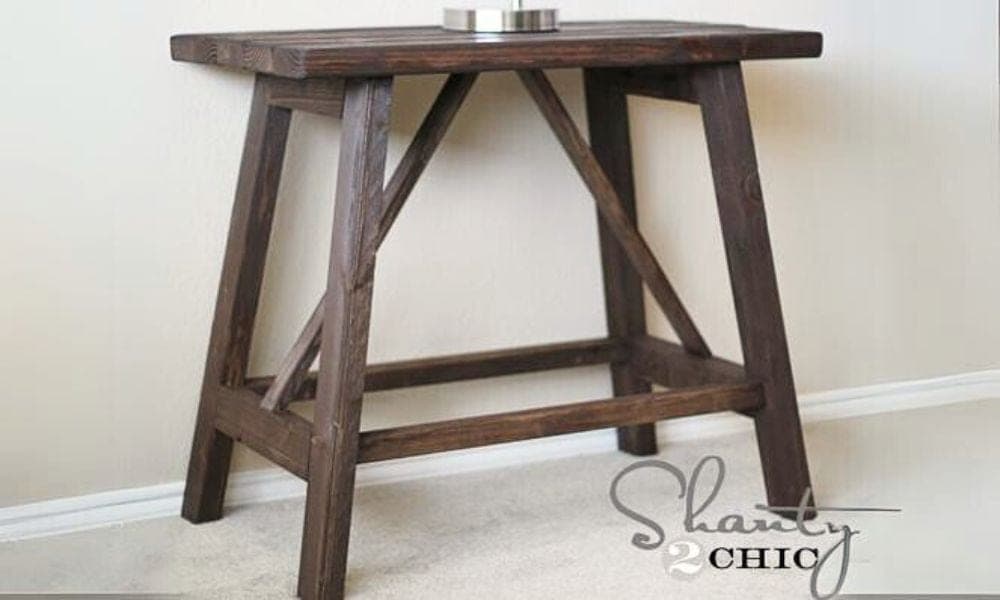 A small end table with angled 2x3 truss-shaped legs and a 2x4 tabletop