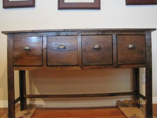Four-drawer console table on simple square legs