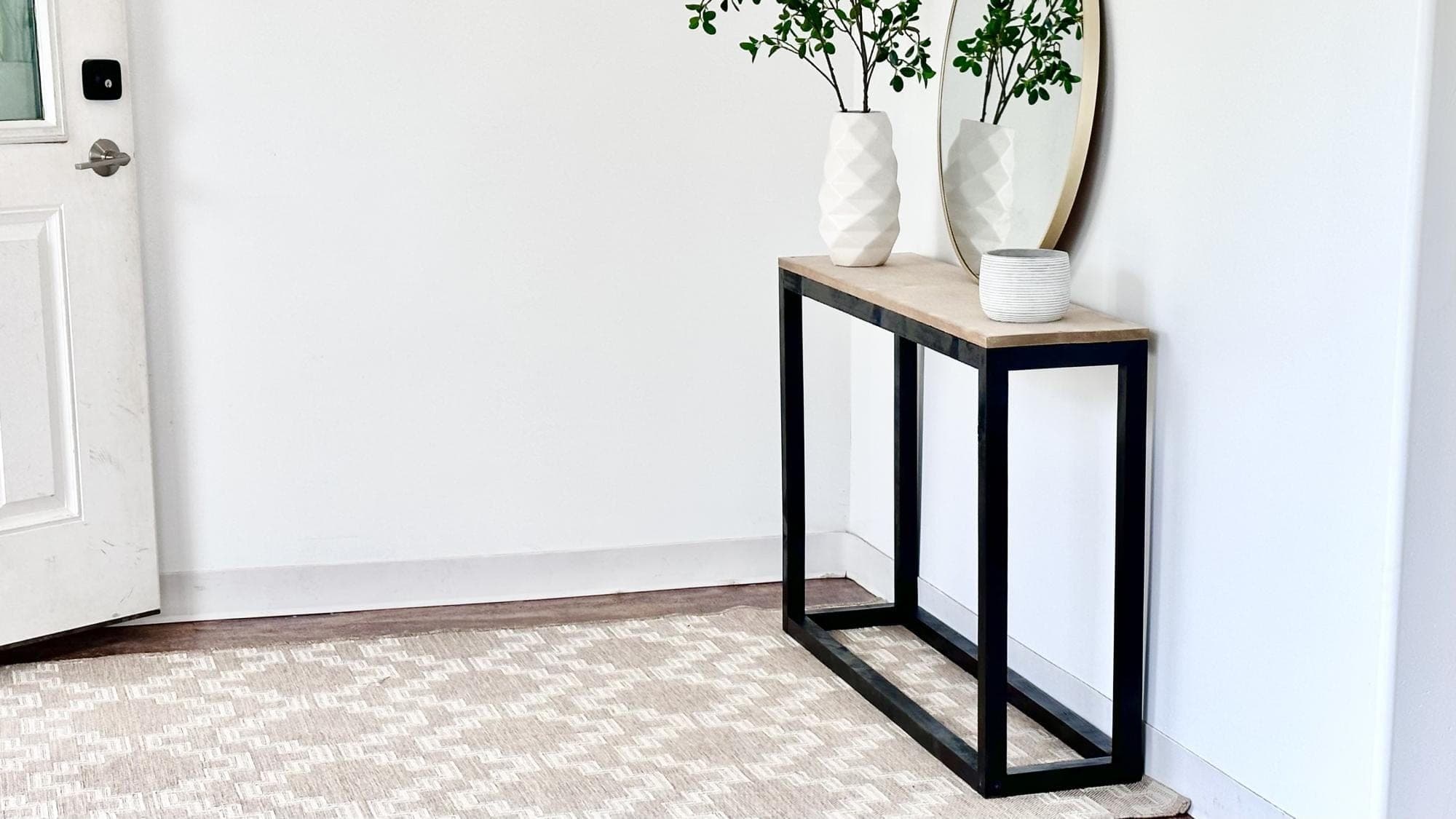 Simple box frame console table with a single-board top