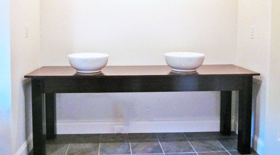 Open-frame farmhouse-style double vanity with vessel sinks