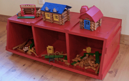 Divided wooden storage bin with an angled front lip