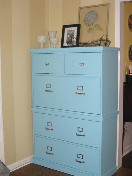 Wide file drawer built into the base of an office bookshelf
