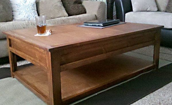 Kids' train table with a trimmed top and removable inserts