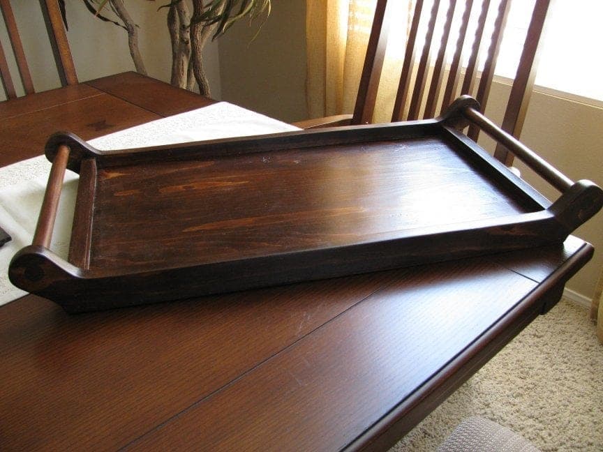 Wooden serving tray with dowel handles and cut-out grips