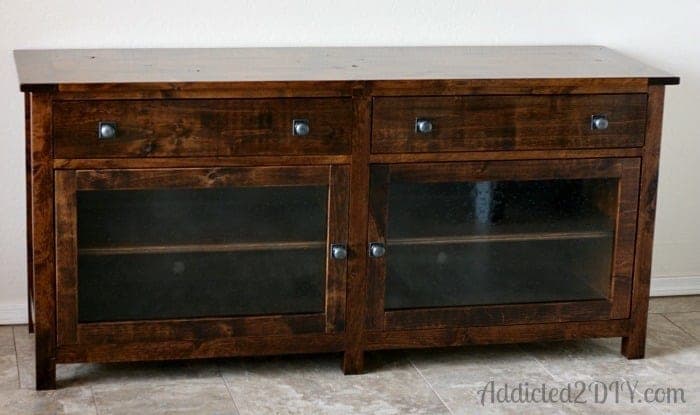 Benchmark media console with acrylic-front cabinet doors