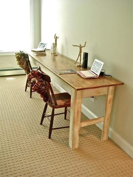 Narrow farmhouse dining table with tapered legs