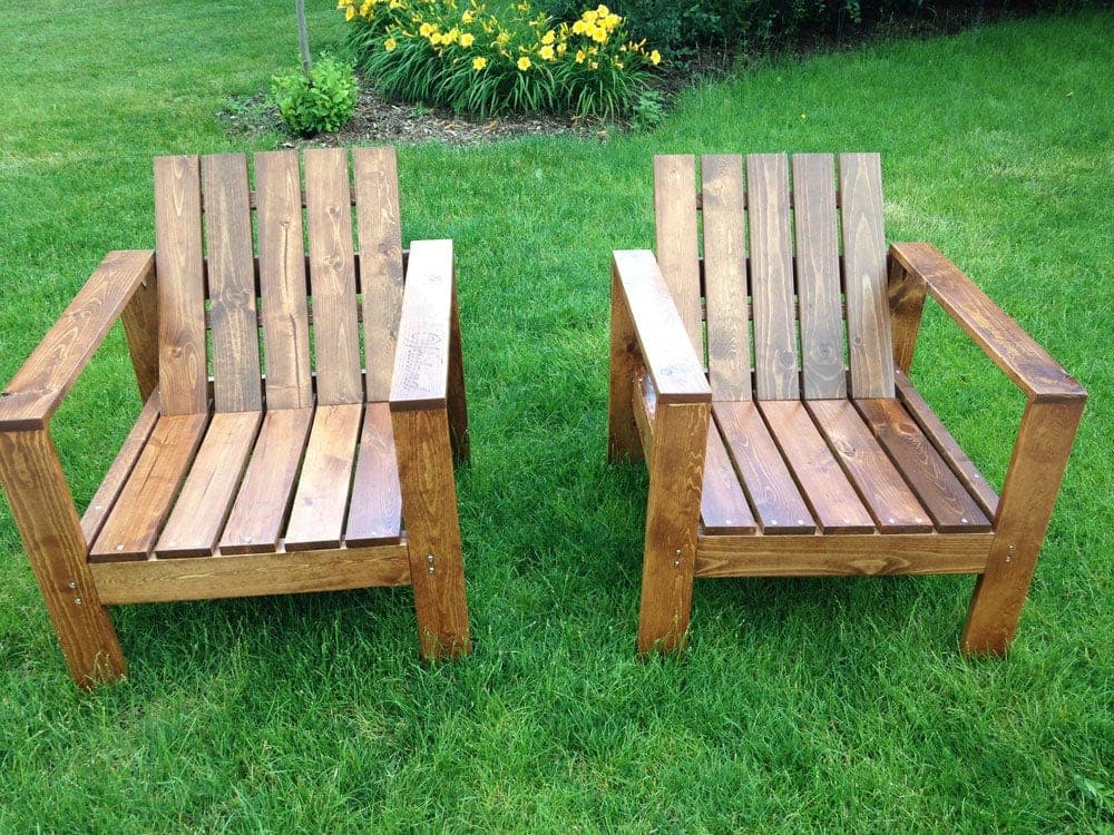 Simple modern slatted outdoor chair with wide arm rests