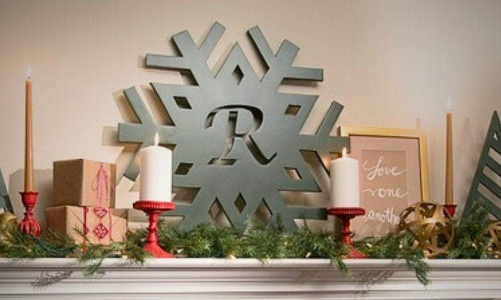 Scroll-cut plywood monogrammed snowflake wall decor