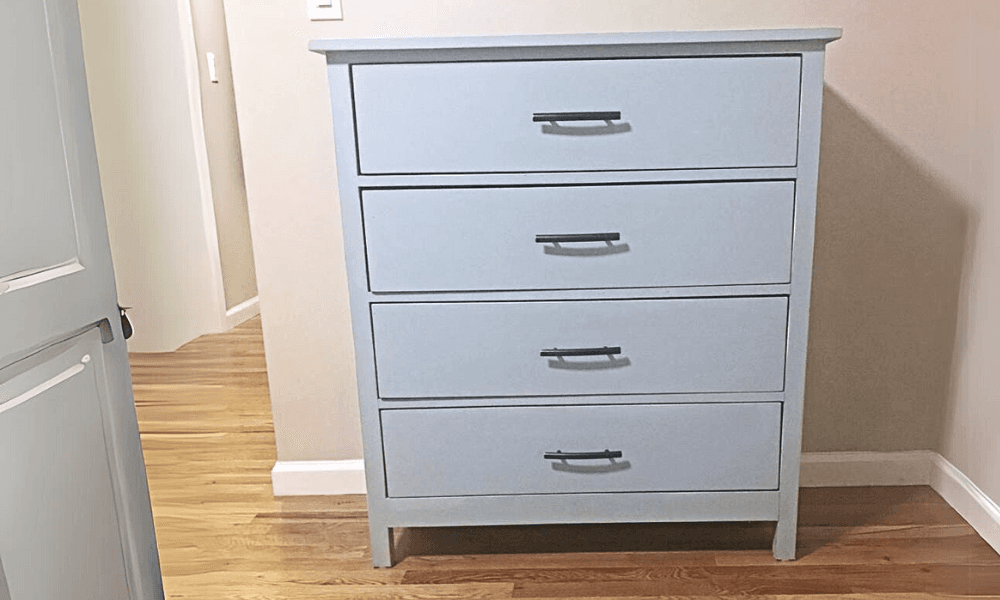 A narrow-depth four-drawer dresser built from solid 1x12 sides