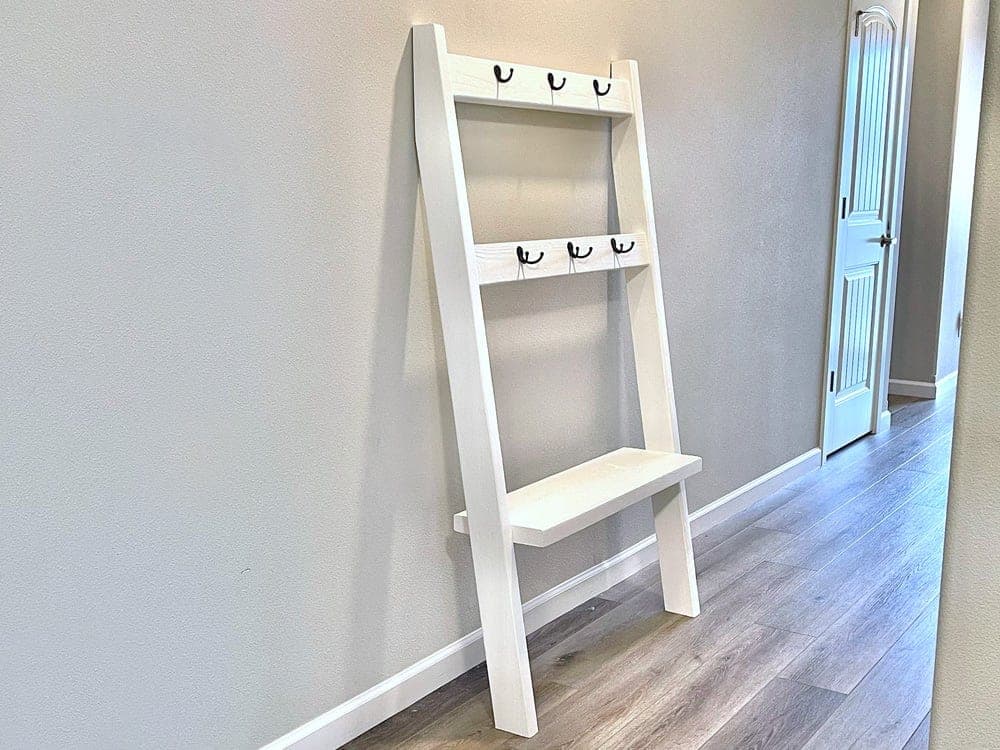 2x4 leaning hall tree with a shelf and coat hooks