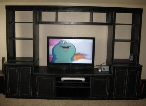 Modular storage base cabinet with a door and adjustable shelf