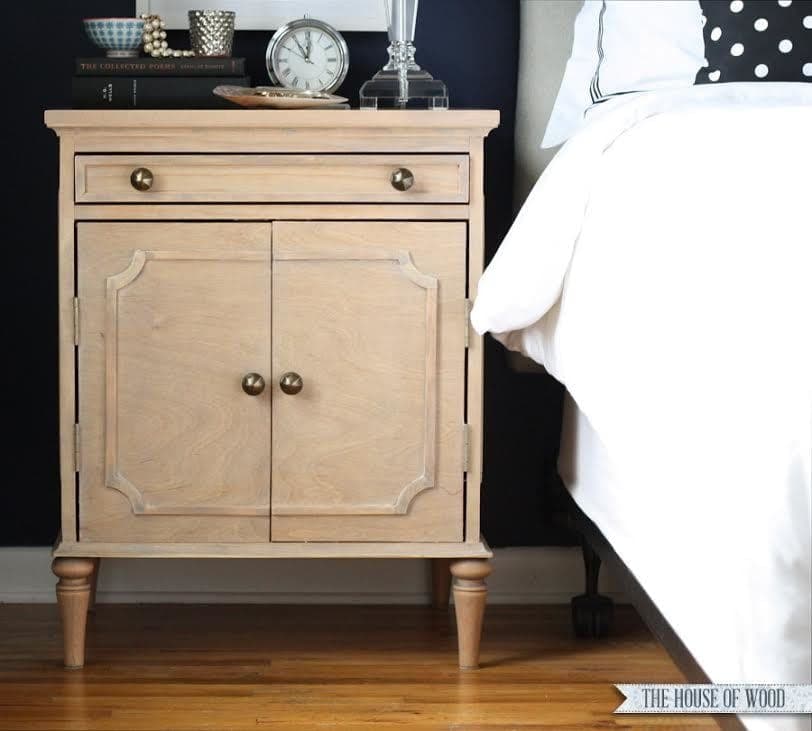 Emily nightstand with turned legs and scroll-sawn moulding accents