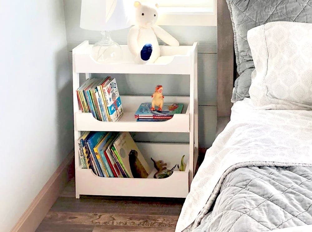 Small leaning ladder bookshelf with three graduated trays