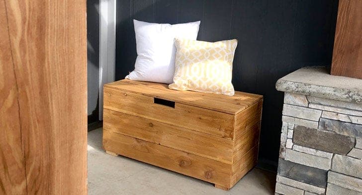 Modern cedar deck storage bench with hinged slat lid