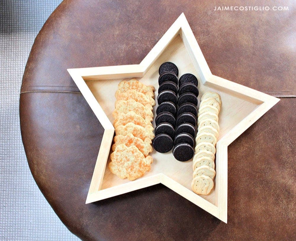 A five-pointed wood star serving tray with a plywood backer
