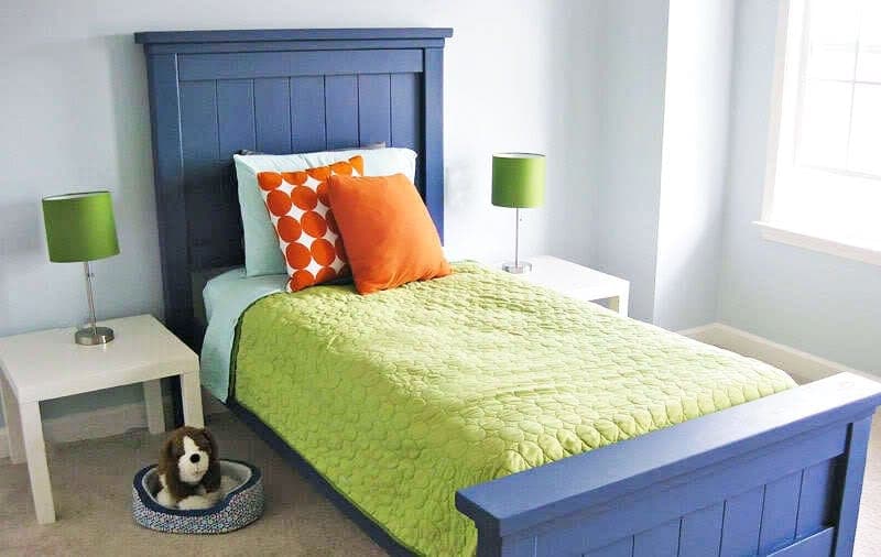 Twin farmhouse bed with solid posts and plank headboard and footboard