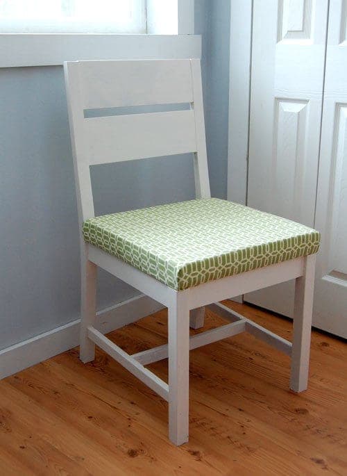 Classic upholstered accent chair with 2x4 back legs