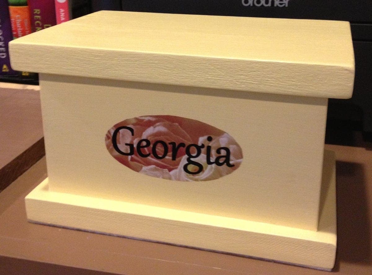 Small hinged jewelry box built from scrap wood
