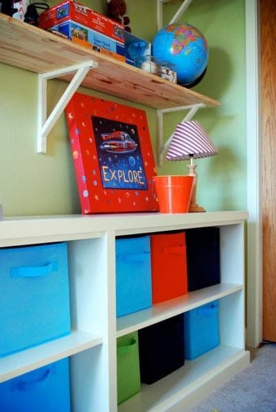 Wide, shallow plywood bookcase base for a modular office desk