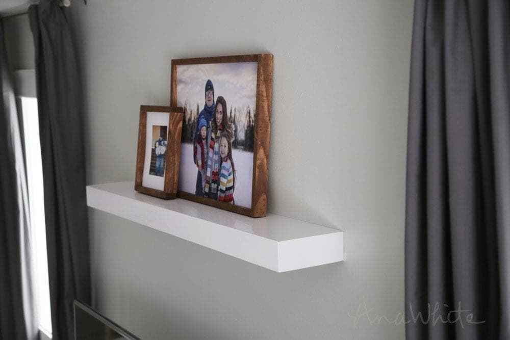 Clean modern floating shelf skinned in plywood with no visible brackets