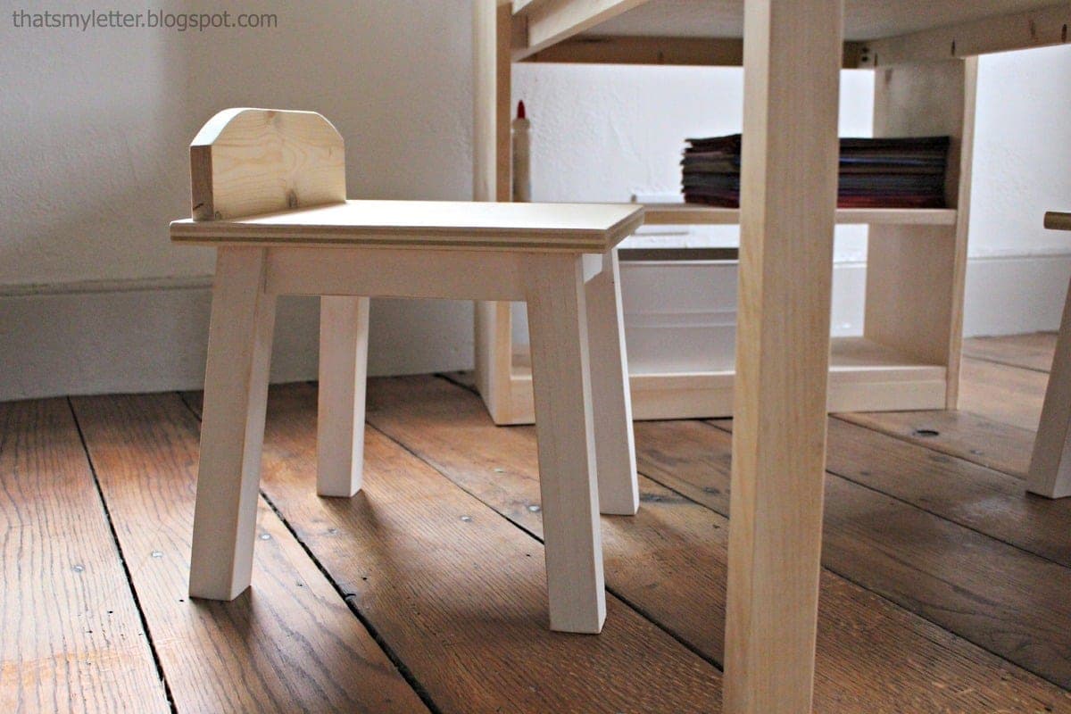 Small splay-legged kids stool with a seat back