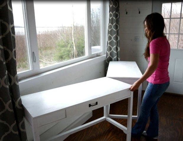 Compact desk with a drawer that hinges open into a dining table