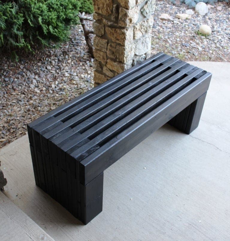 Modern laminated slat bench with integrated slat legs