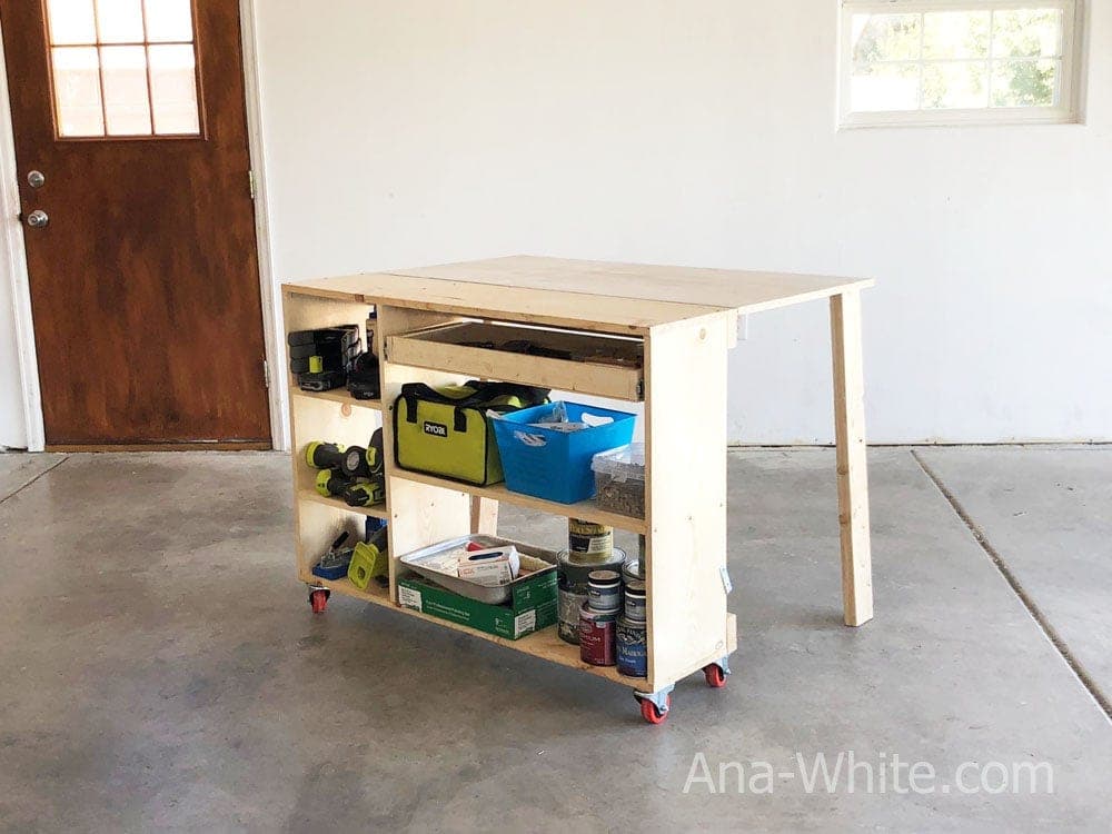 Rolling folding workbench cabinet with a piano-hinged top