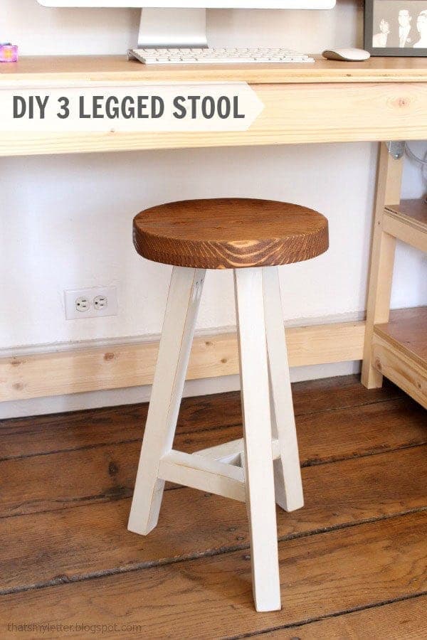 Vintage-style three-legged wooden stool