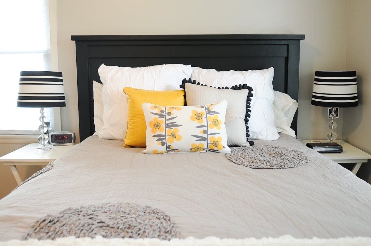 Queen size farmhouse bed with planked headboard and footboard