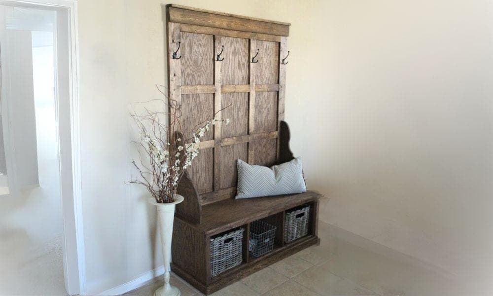 Farmhouse hall tree with a storage bench and coat hook panel