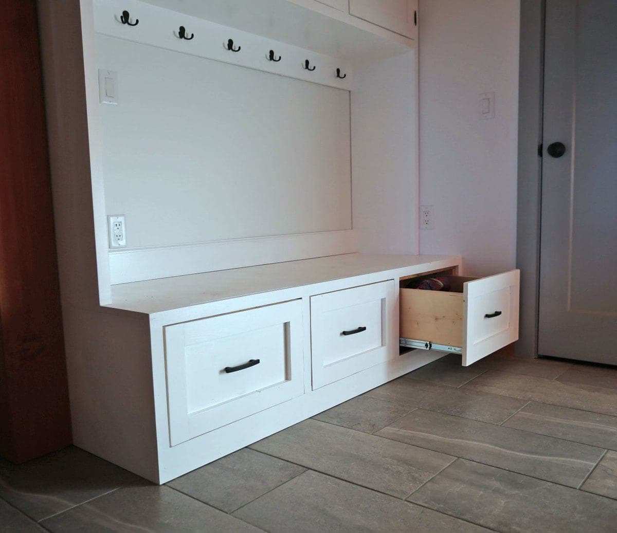 Six-foot mudroom bench with three drawers on full-extension slides