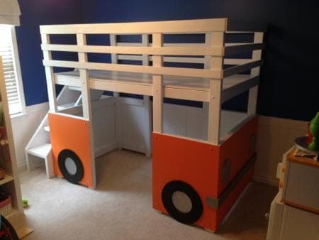 Loft bed built and decorated to look like a VW-style surf bus