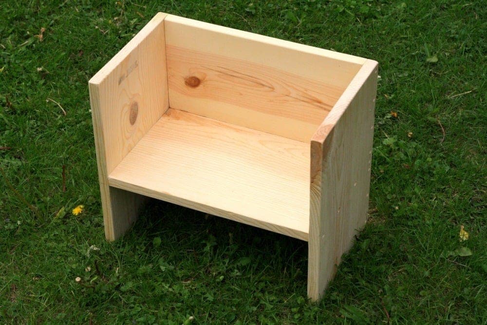 Toddler flip chair that gives two seat heights depending on which way up it sits