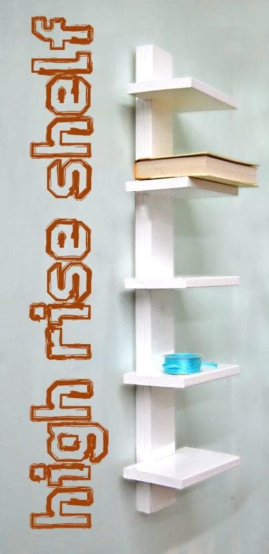 Small wall shelf with shelves floating off a back board on spacers