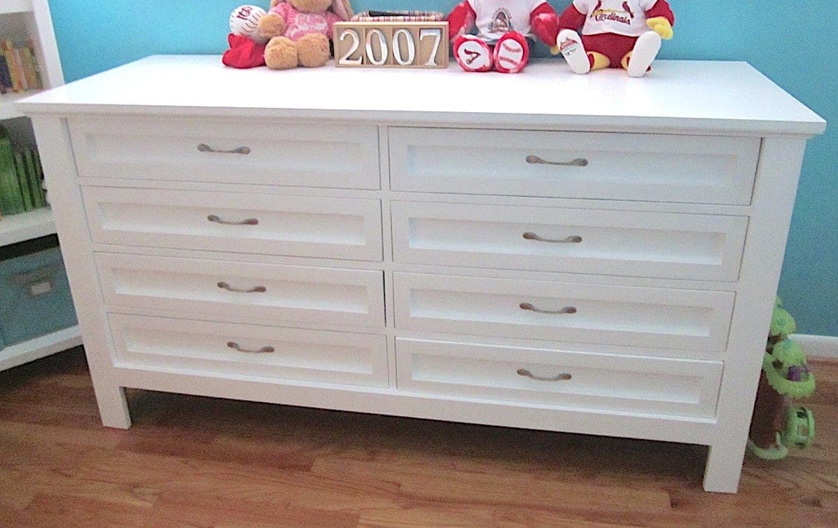 Wide eight-drawer dresser with framed drawer fronts and tapered feet