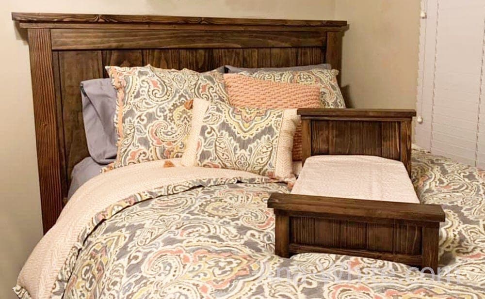 Miniature farmhouse-style bed for an 18-inch doll