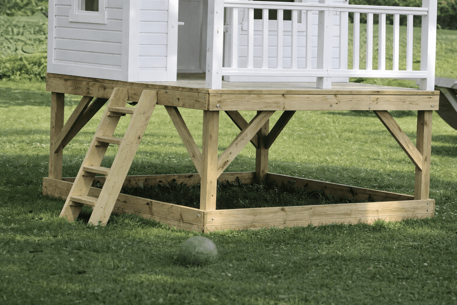 Raised 8x8 wooden deck platform on 4x4 posts, framed for a playhouse