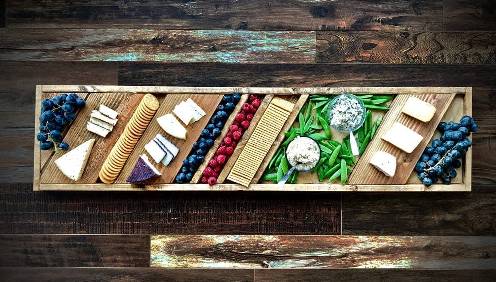Scrap wood charcuterie serving board with angled channels