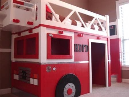Twin loft bed built and painted to look like a fire truck cab