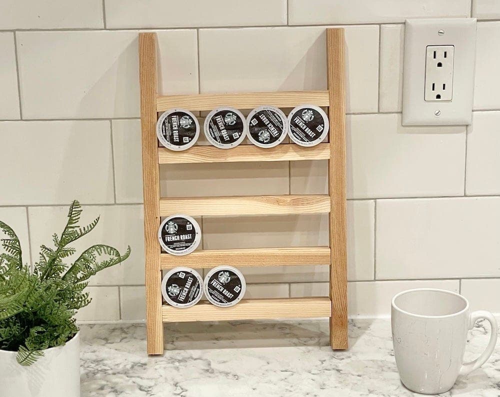 Small leaning wooden ladder rack for holding coffee pods